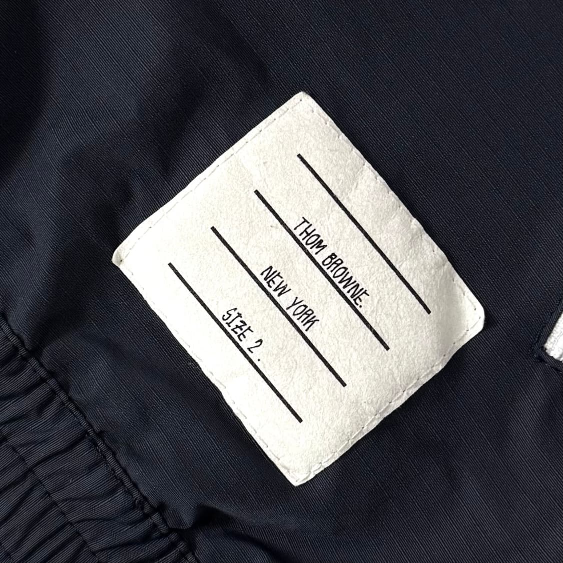 [2/당일출고]톰브라운 립스탑 바람막이 상품이미지6