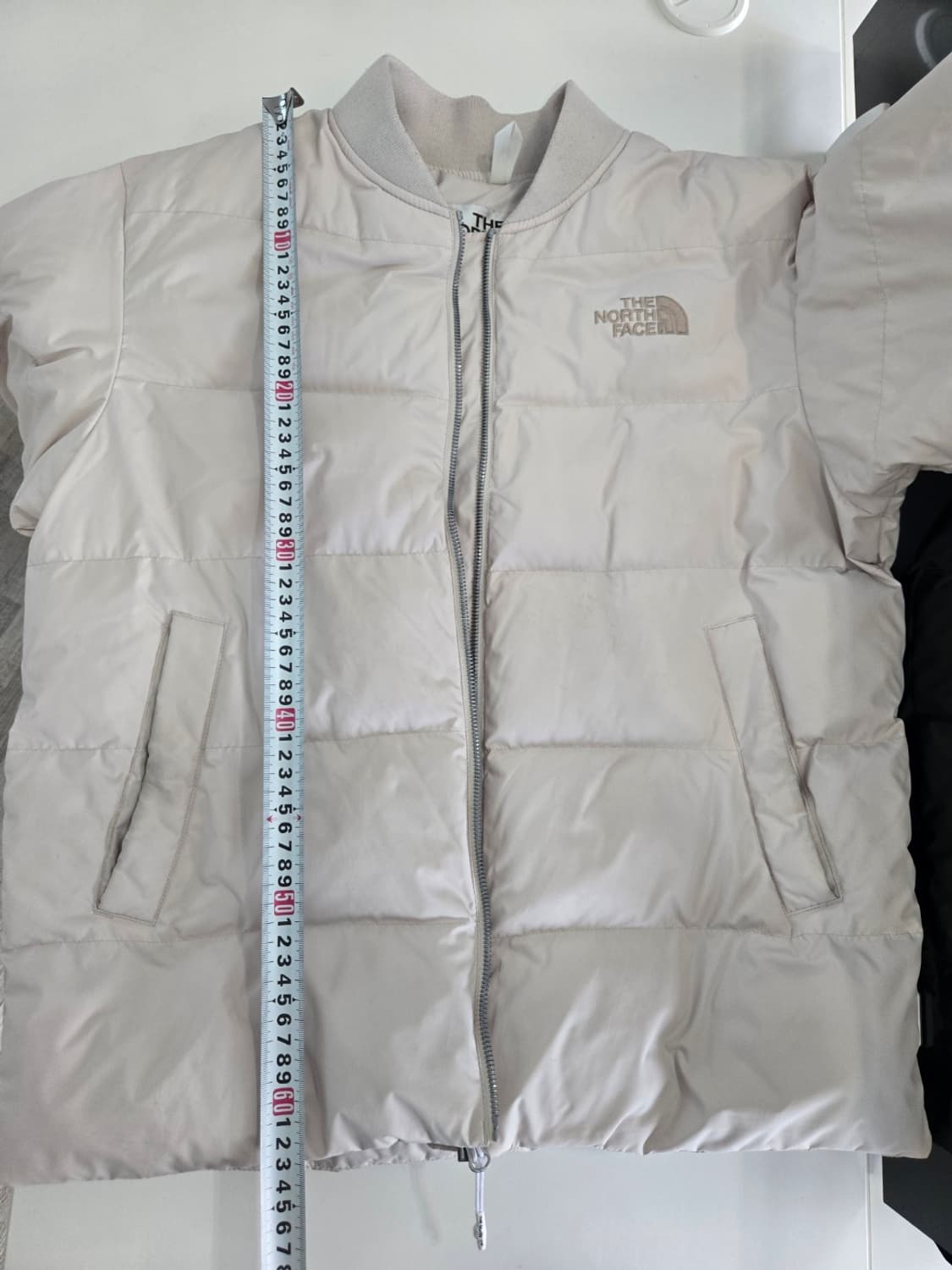 노스페이스 경량 패딩 아이보리 색상, 사이즈는 90(S) 상품이미지6