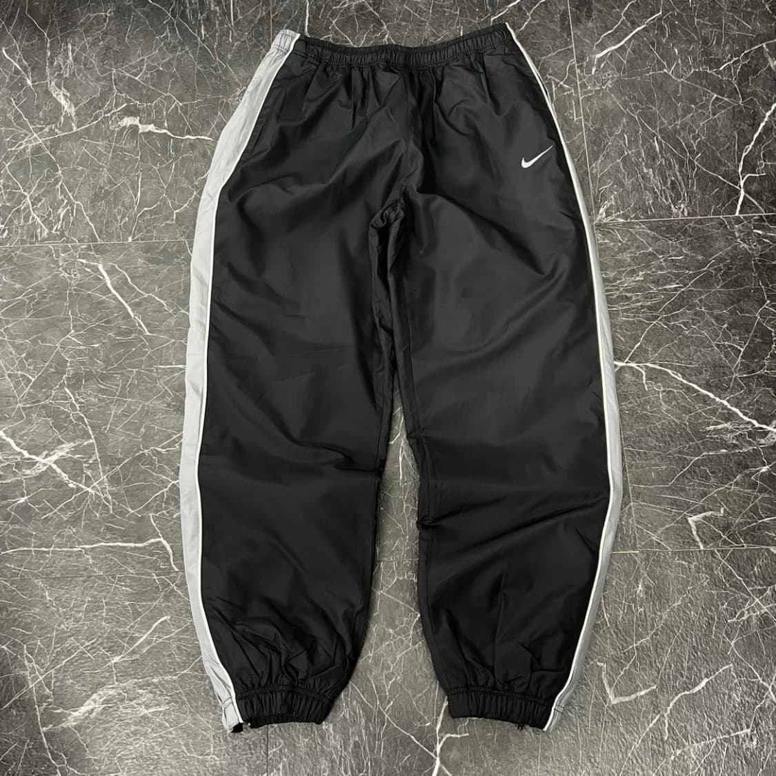 나이키 스우시 빅 파이핑 패디드 오버와이드 조거 트랙 상품이미지4