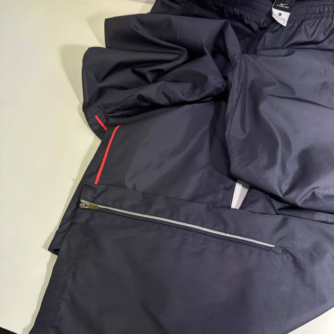 우먼M-L 나이키 다크네이비 레귤러핏 바람막이 팬츠 상품이미지3