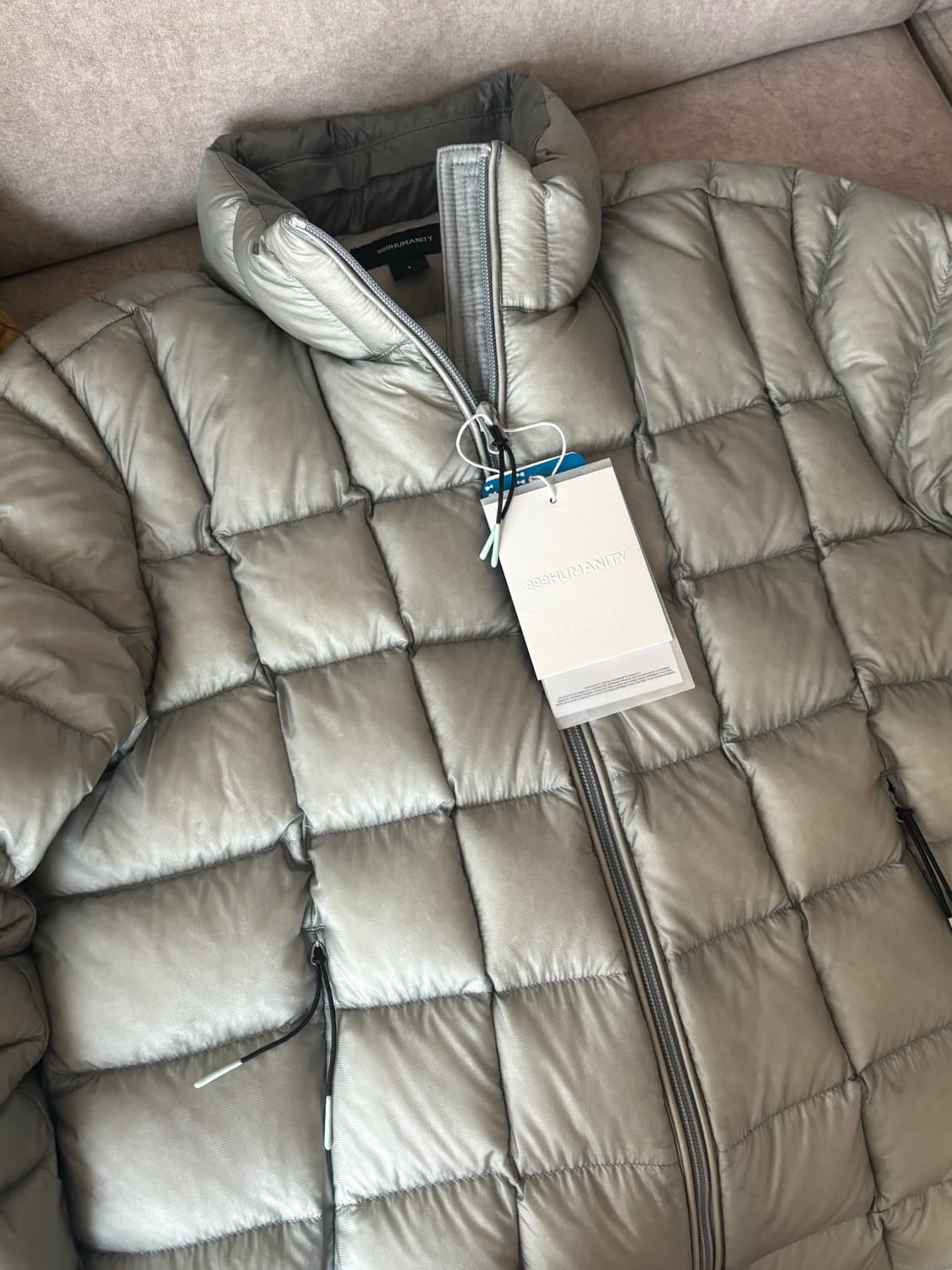 999휴머니티 패딩 Light Grey 1size 새상품 상품이미지1