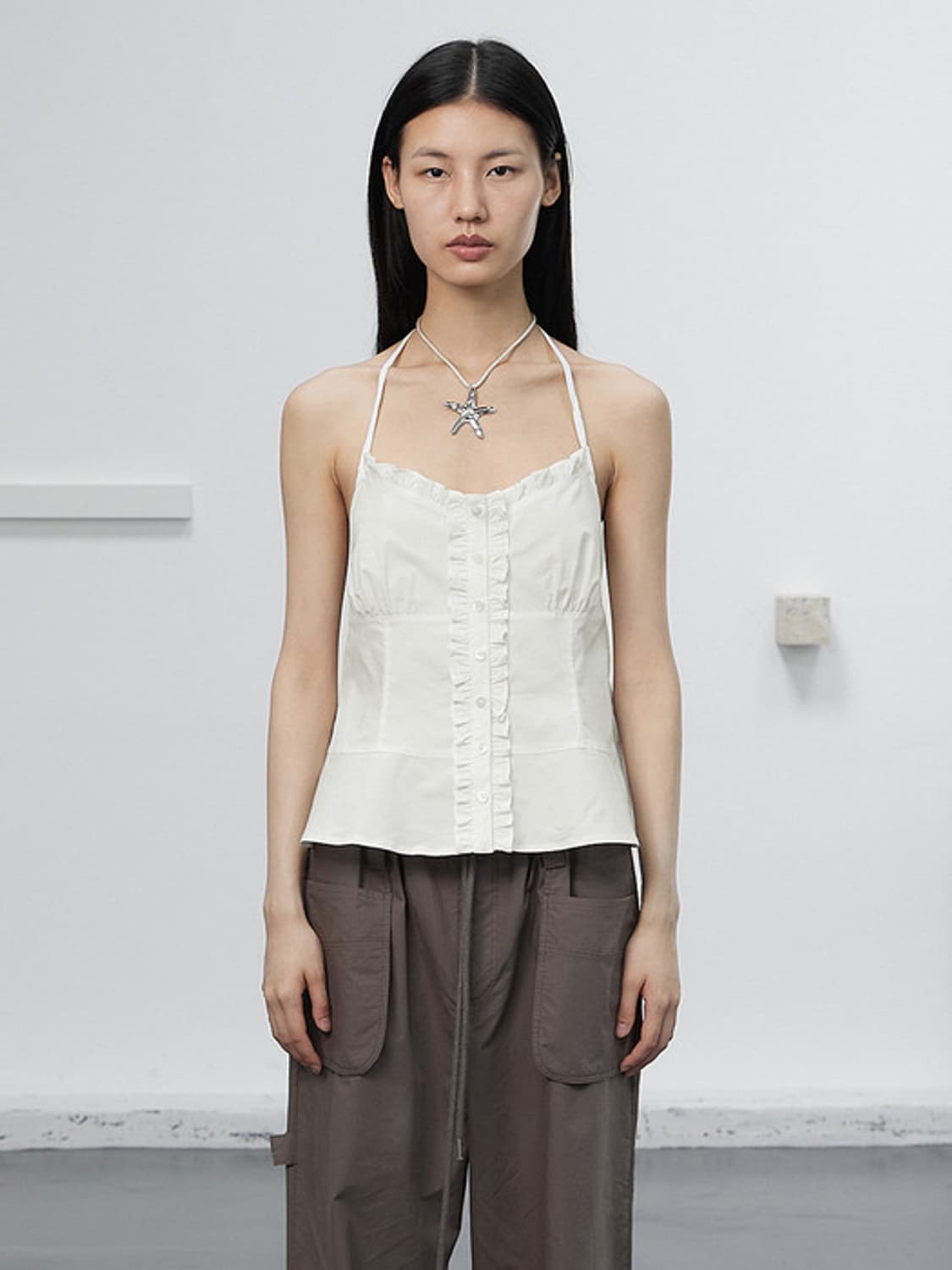 세릭 FRILL HALTER PEPLUM BLOUSE 상품이미지1