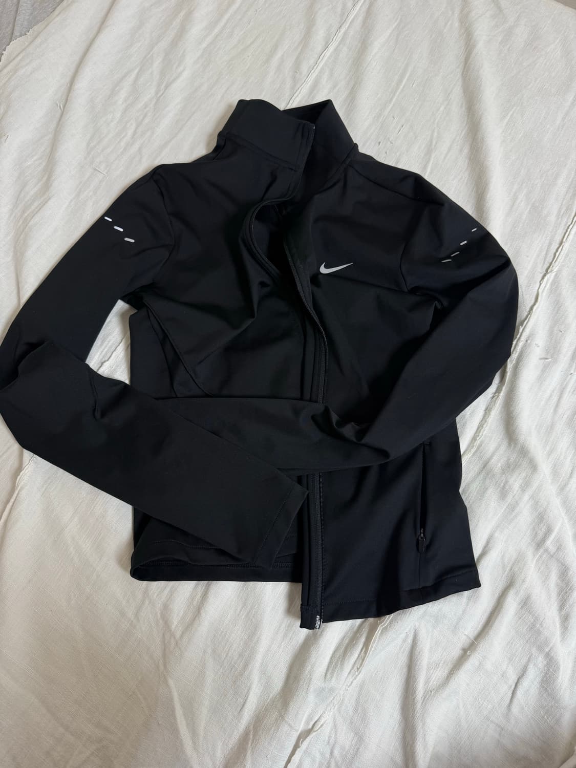 나이키 러닝 크롭져지 상품이미지1