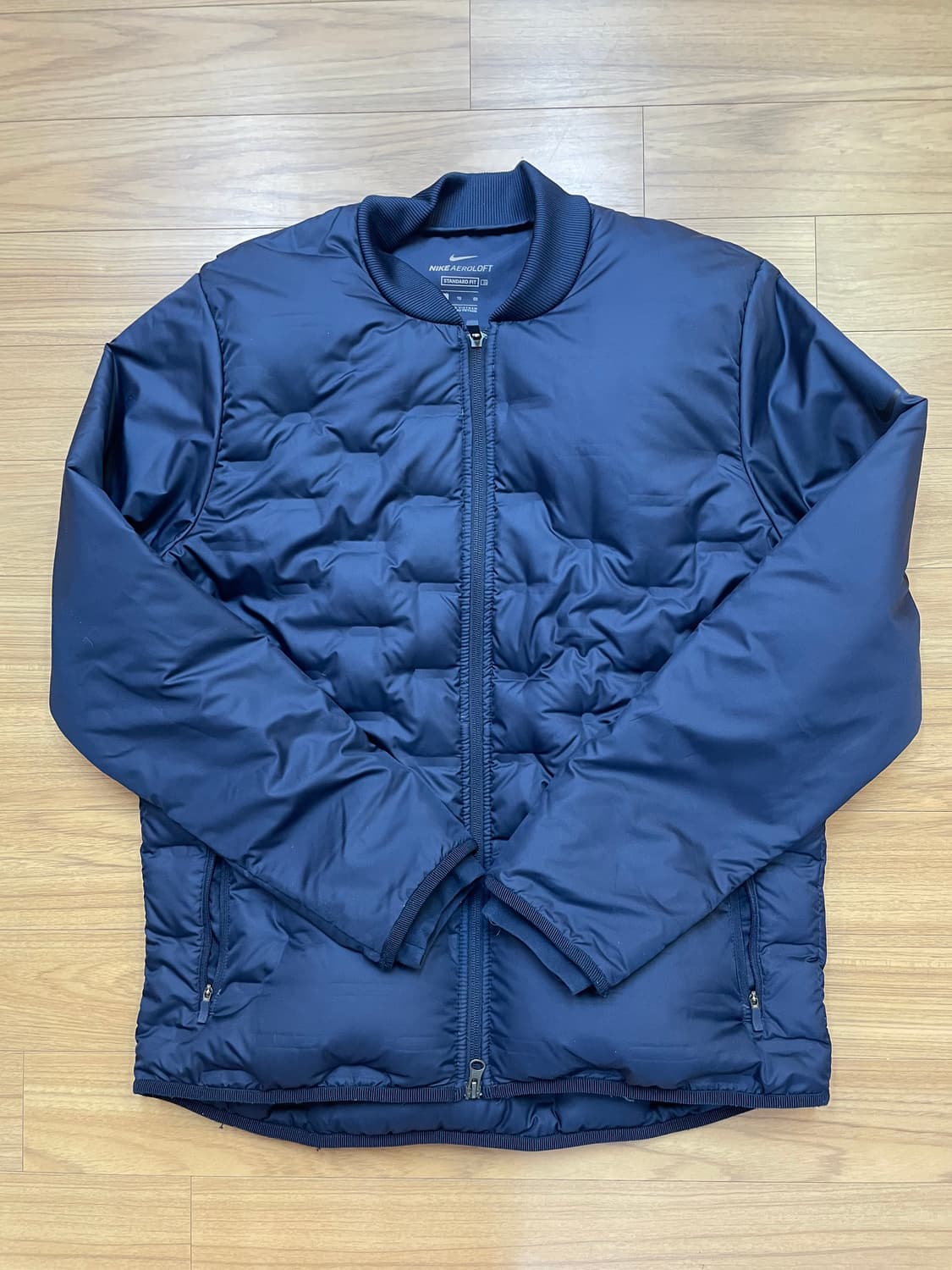 네이비 색상의 나이키 에어로로프트 경량 자켓입니다. XL 사이즈로, 간절 상품이미지1