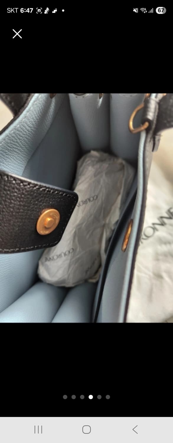 쿠론 멜리아 토트백

가방 몇번안쓴거라 상태깨끗해요
긴끈은 없어요~~
가 상품이미지4