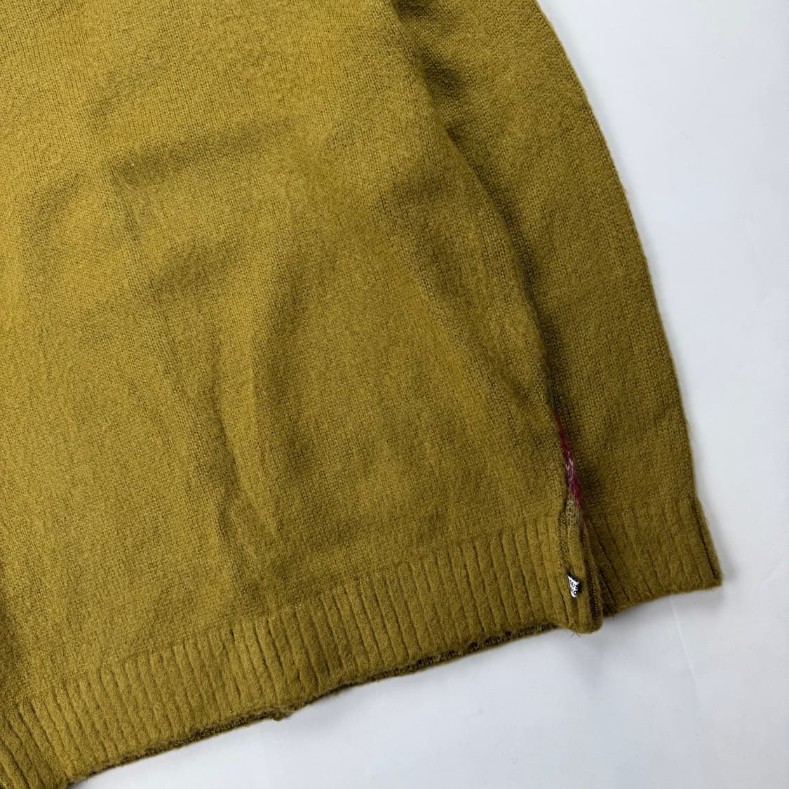 디스이즈네버댓 아가일패턴 니트 가디건 상품이미지10