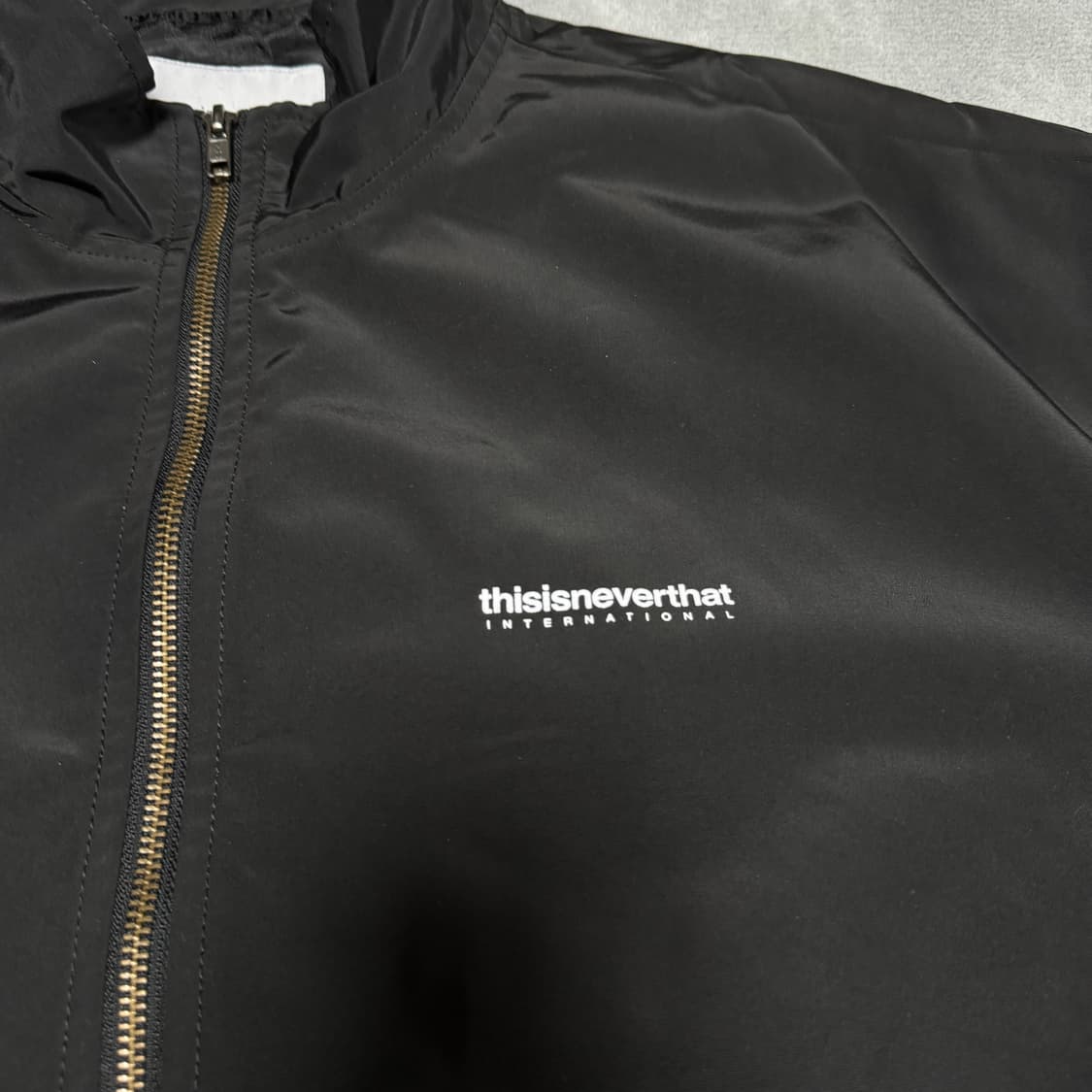 디스이즈네버뎃 바람막이 상품이미지3