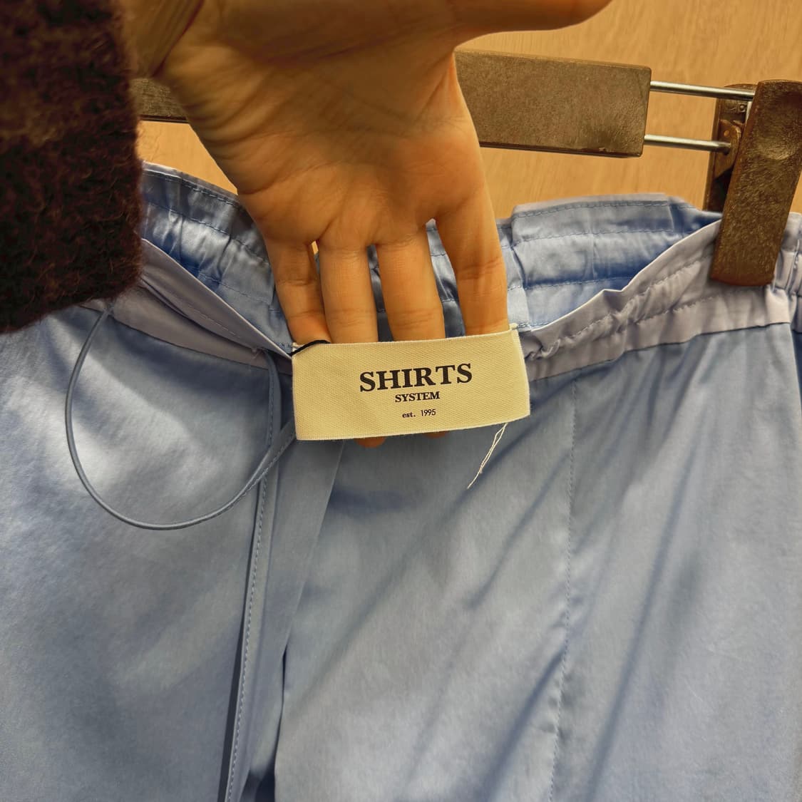 셔츠 시스템 미디 스커트 슬릿 레이어드 스트랩 디테일 A라인 라이트 블루 상품이미지6