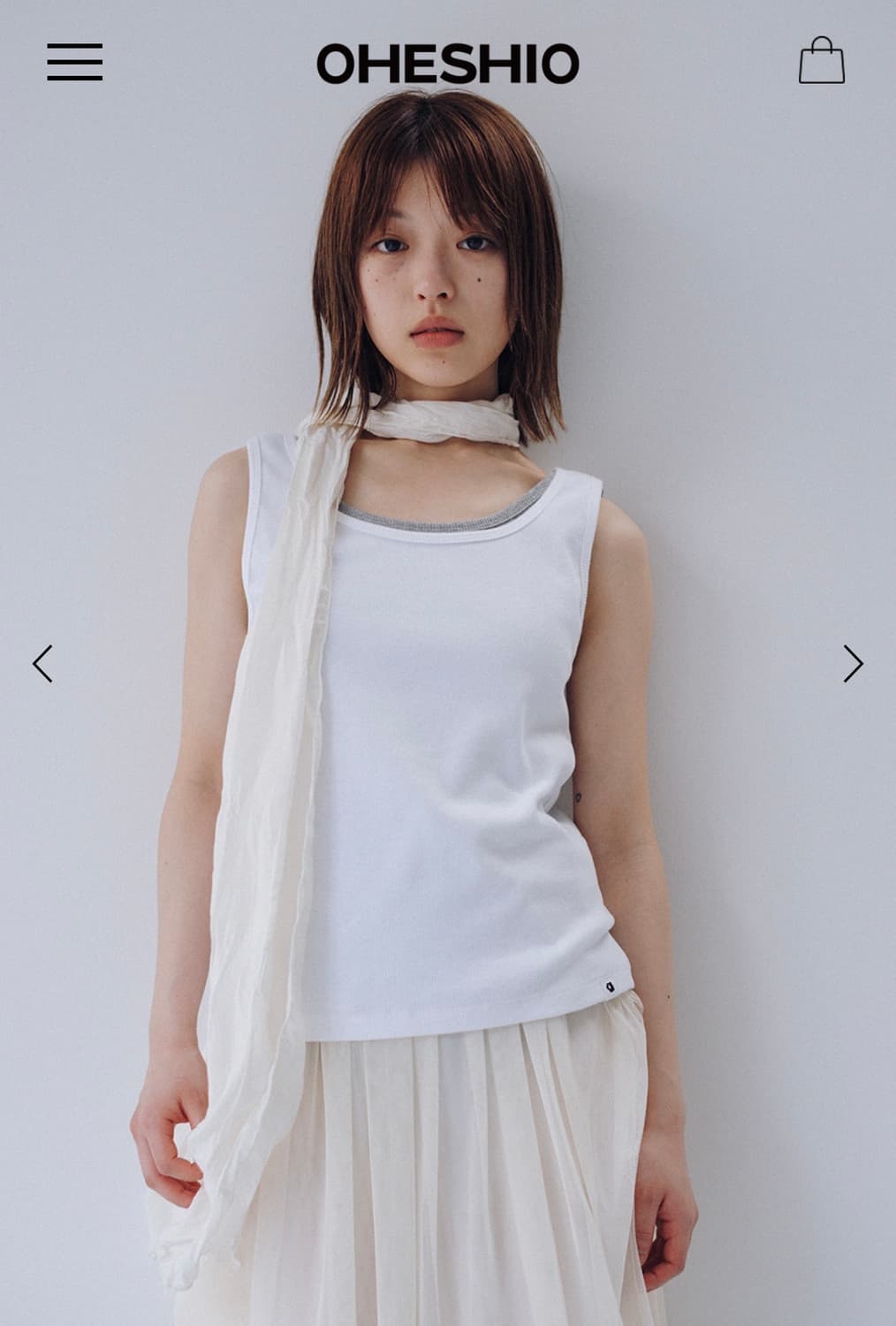 새상품 오헤시오 베이직 유넥 슬리브리스 화이트 상품이미지1