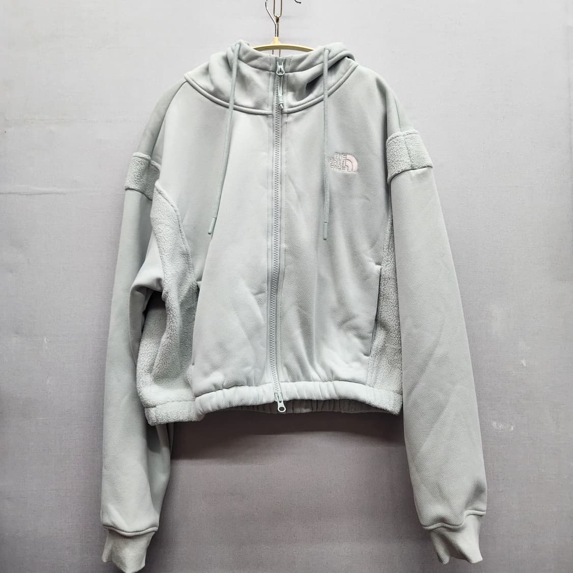 노스페이스 옆라인 디테일 투웨이 크롭 스트링 후드집업90(L) 상품이미지1