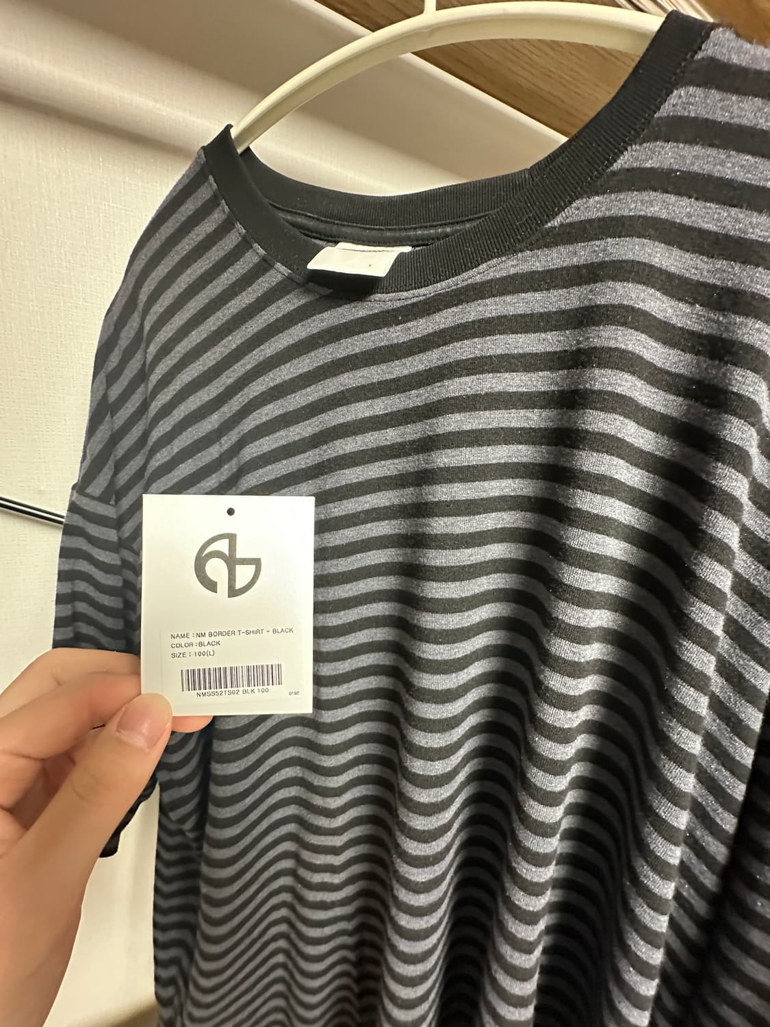 노메뉴얼 NM BORDER 티셔츠 블랙 상품이미지1