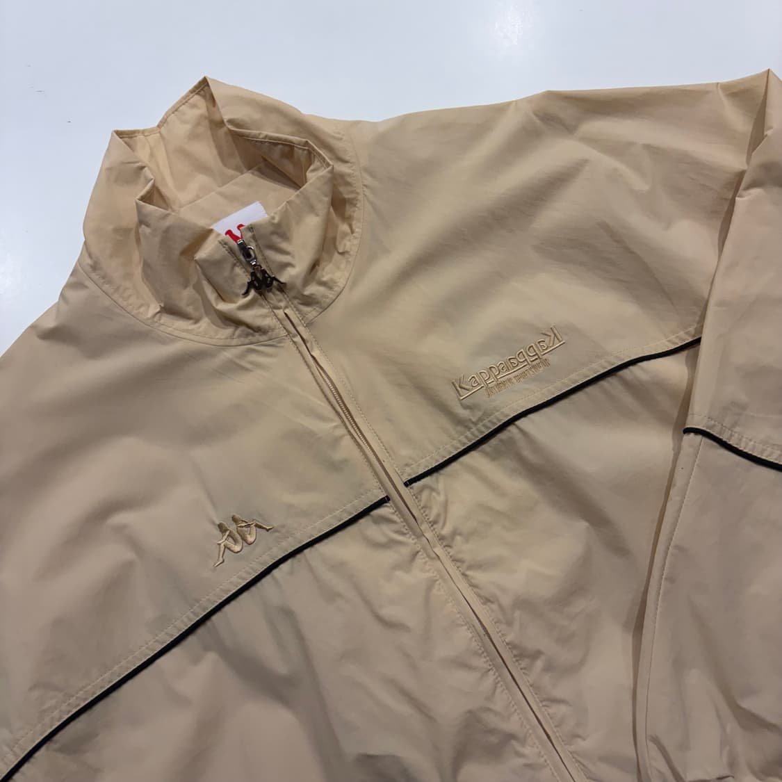 [L] 카파 Kappa 파이핑 우븐 베이지색 바람막이 자켓 D821 상품이미지3