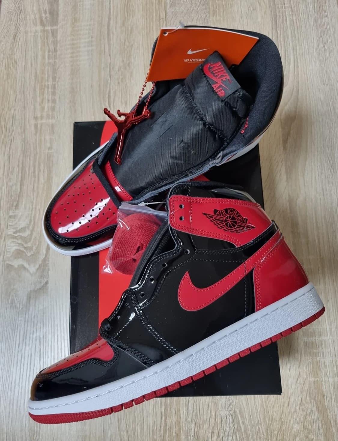 [275]조던1 하이 OG 페이턴트 브레드  상품이미지1