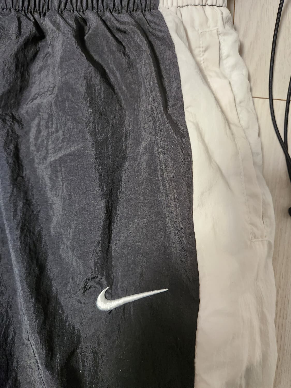 나이키 애슬레틱스 우븐 후드집업 바람막이 세트 사이즈95 m

여러 중고 상품이미지9