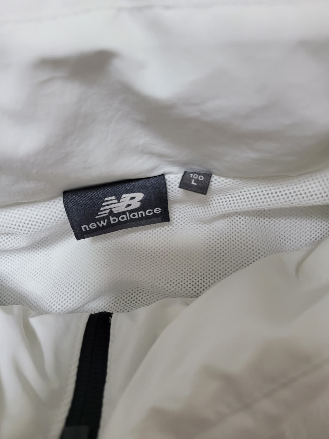 뉴발란스 에센셜 윈드브레이커 집업 자켓 L (100) 상품이미지9