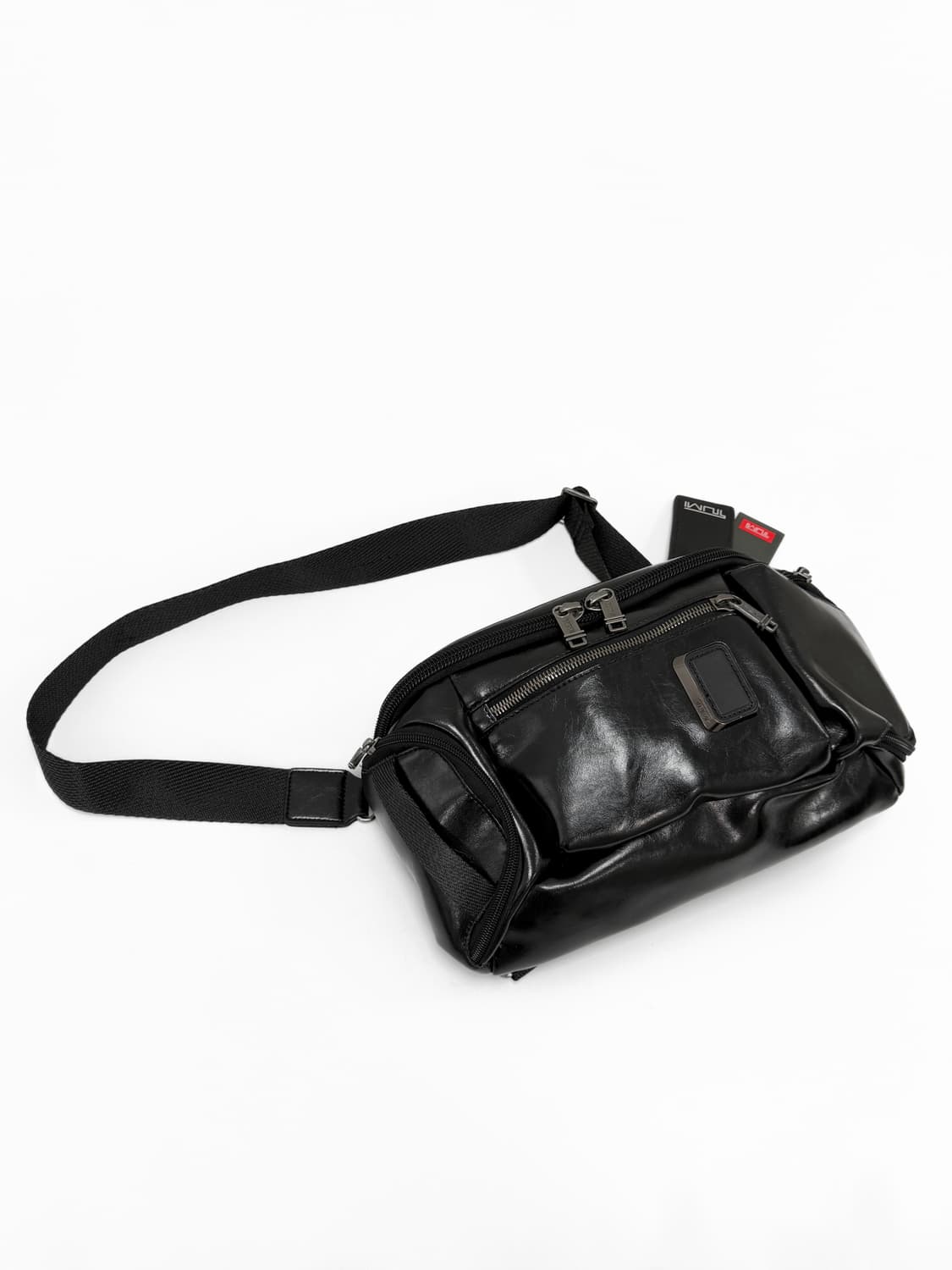 투미 알파 브라보 샤인 램스킨 슬링백 상품이미지1