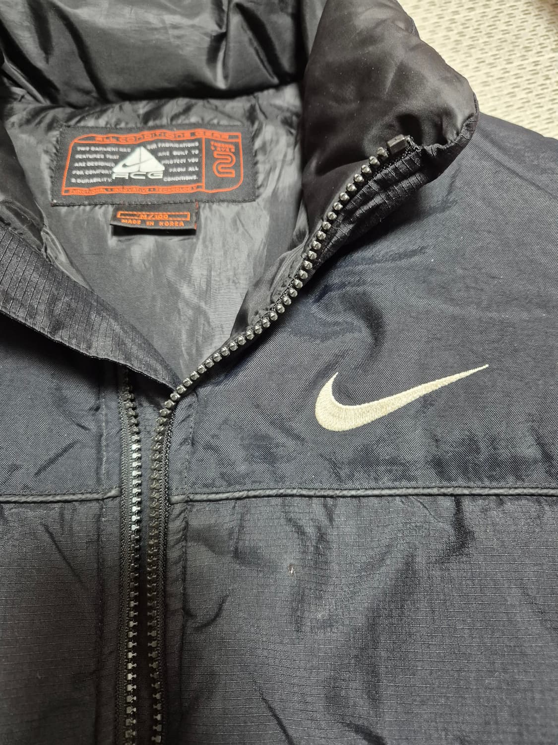 나이키 acg 블랙 로고 다운 패디드 베스트 100 패딩조끼 상품이미지9