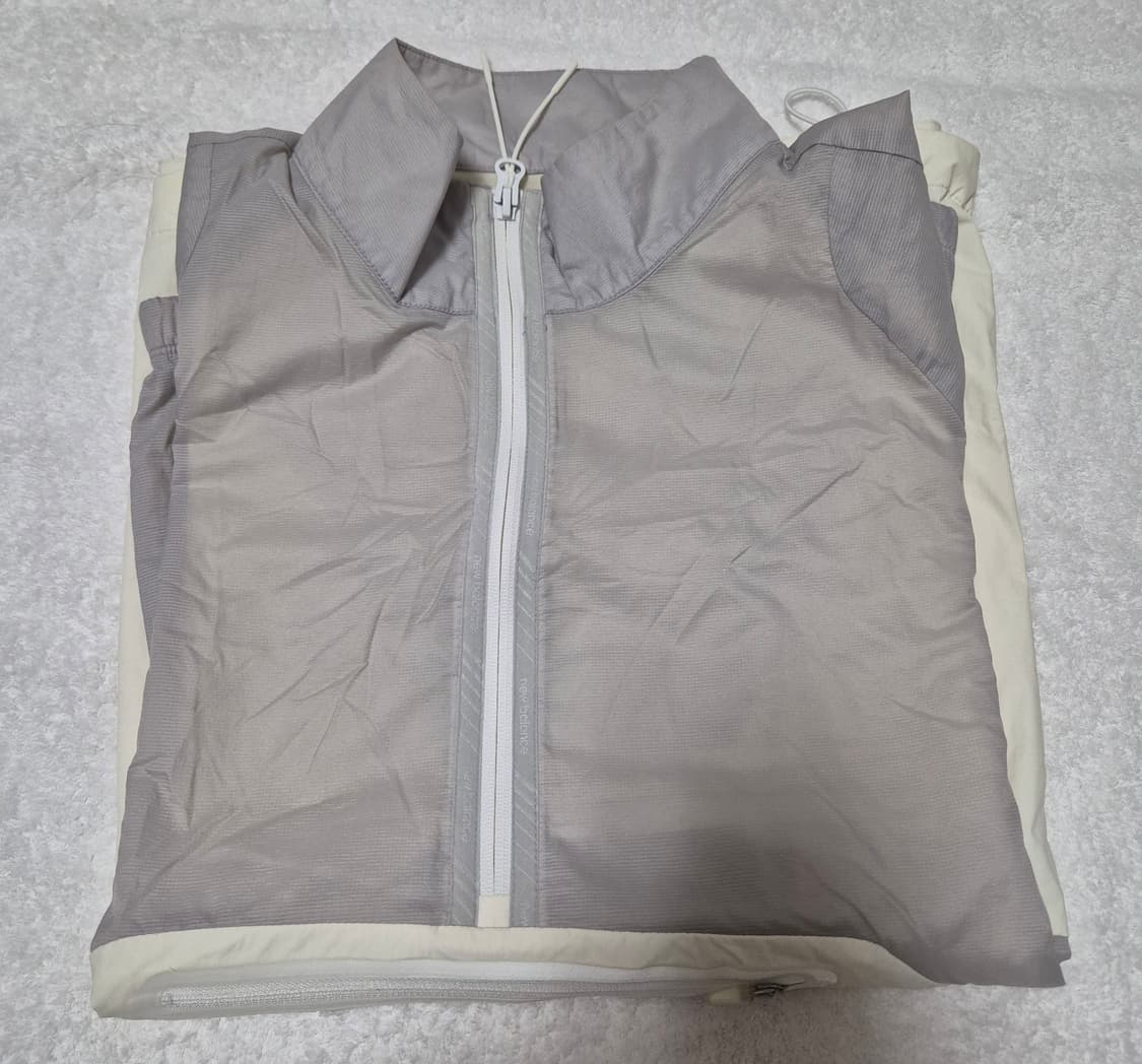 🦕. 뉴발란스 바람막이아노락 105 / L 상품이미지1