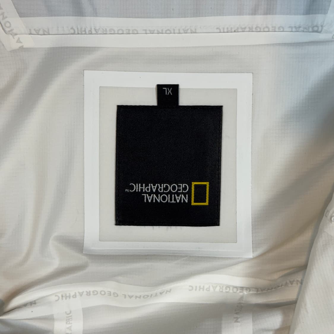 XL) 내셔널지오그래픽 화이트 바람막이 후드 자켓 미사용품 상품이미지8