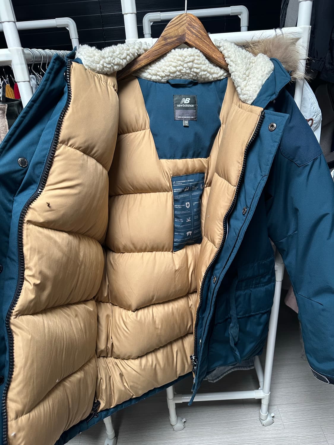 뉴발란스 카메라맨 패딩 네이비 100/L 상품이미지3