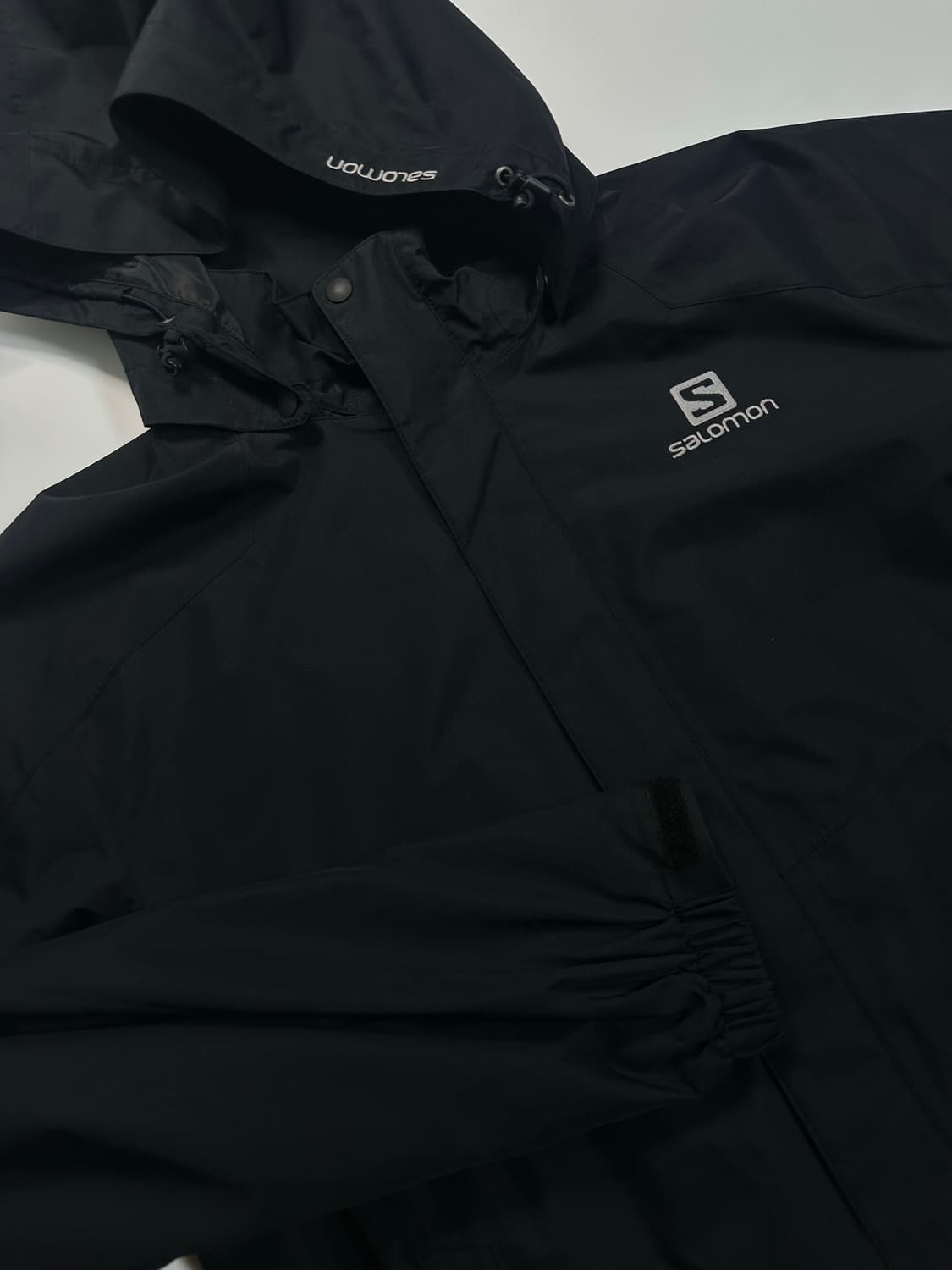 살로몬 구형로고 블랙 바람막이 자켓 상품이미지1