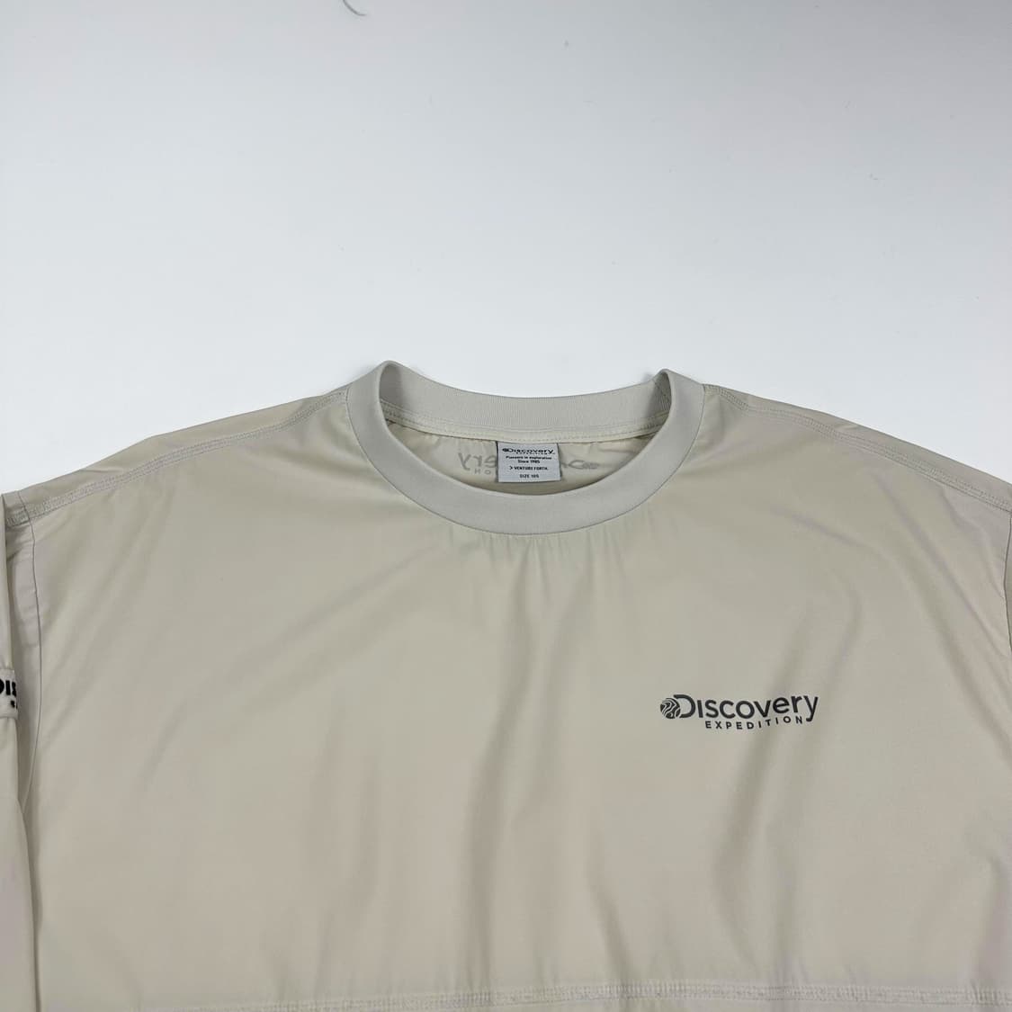 디스커버리 트레이닝 아이보리 바람막이 웜업 (XL) 상품이미지1