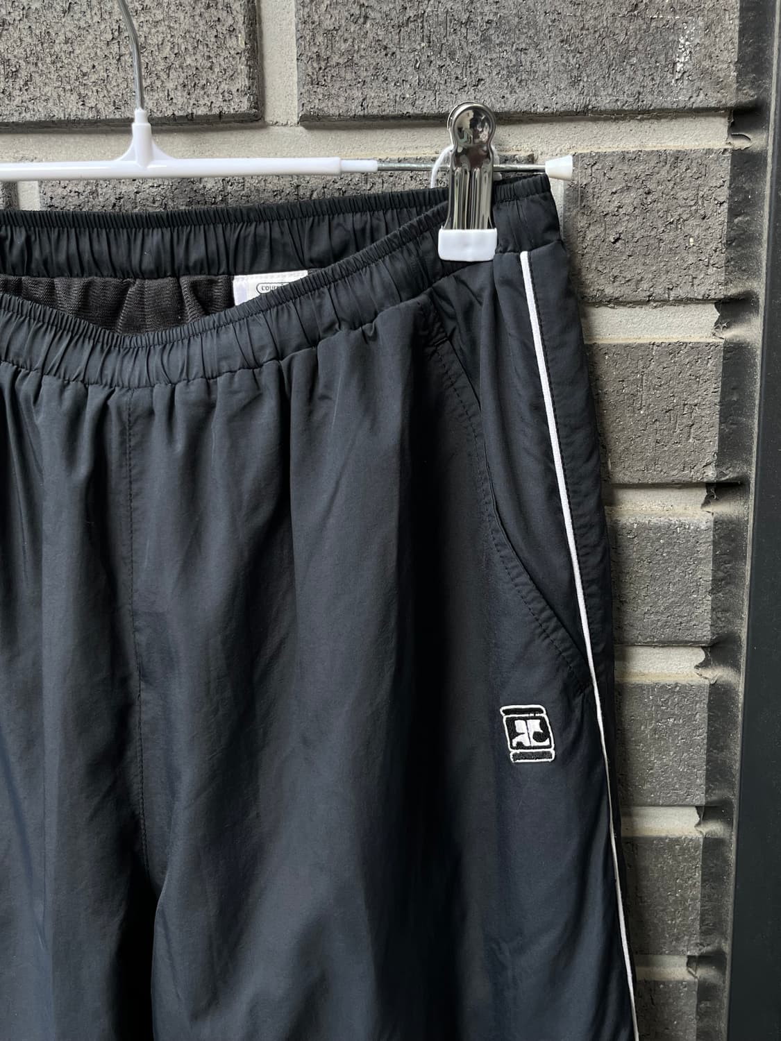 COURREGES 꾸레쥬 로고 트랙팬츠 블랙 상품이미지1