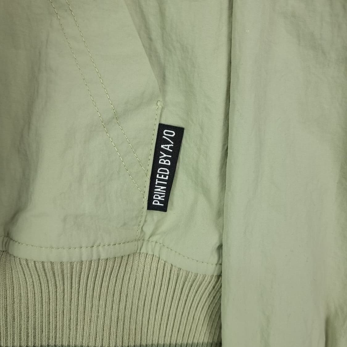 [아조바이아조] 나일론 도킹 프린팅 오버사이즈 후드티 베이지 M18438 상품이미지7