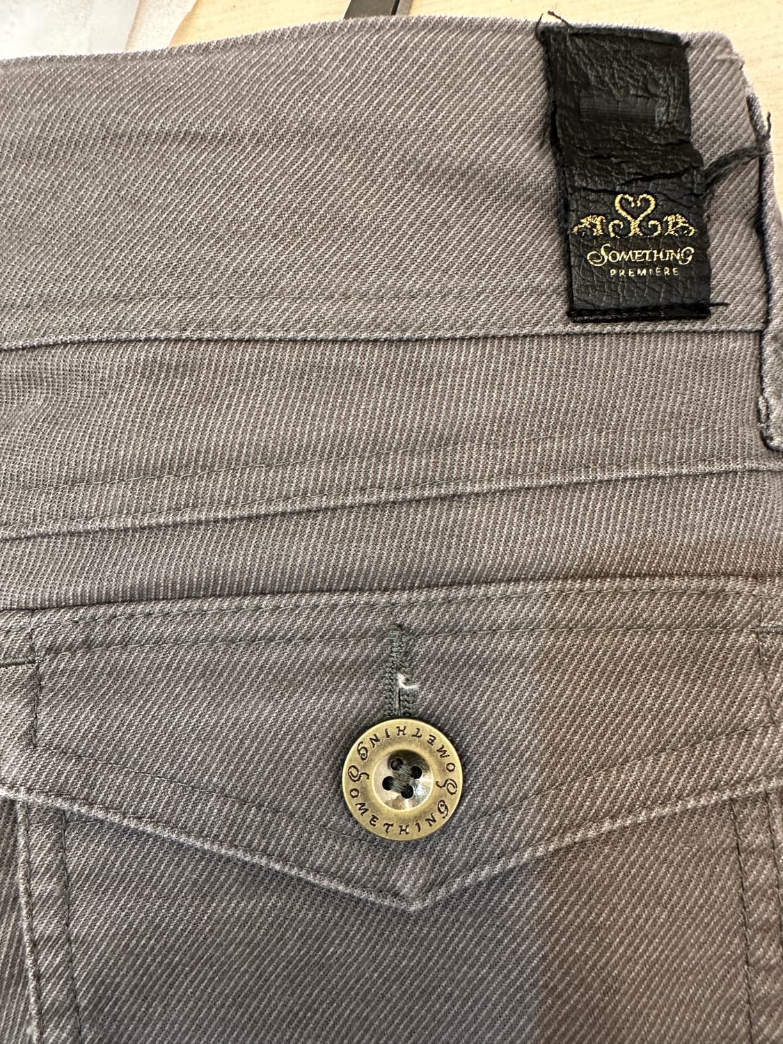 something by edwin 카키 로우 웨이스트 부츠컷 팬츠 상품이미지7