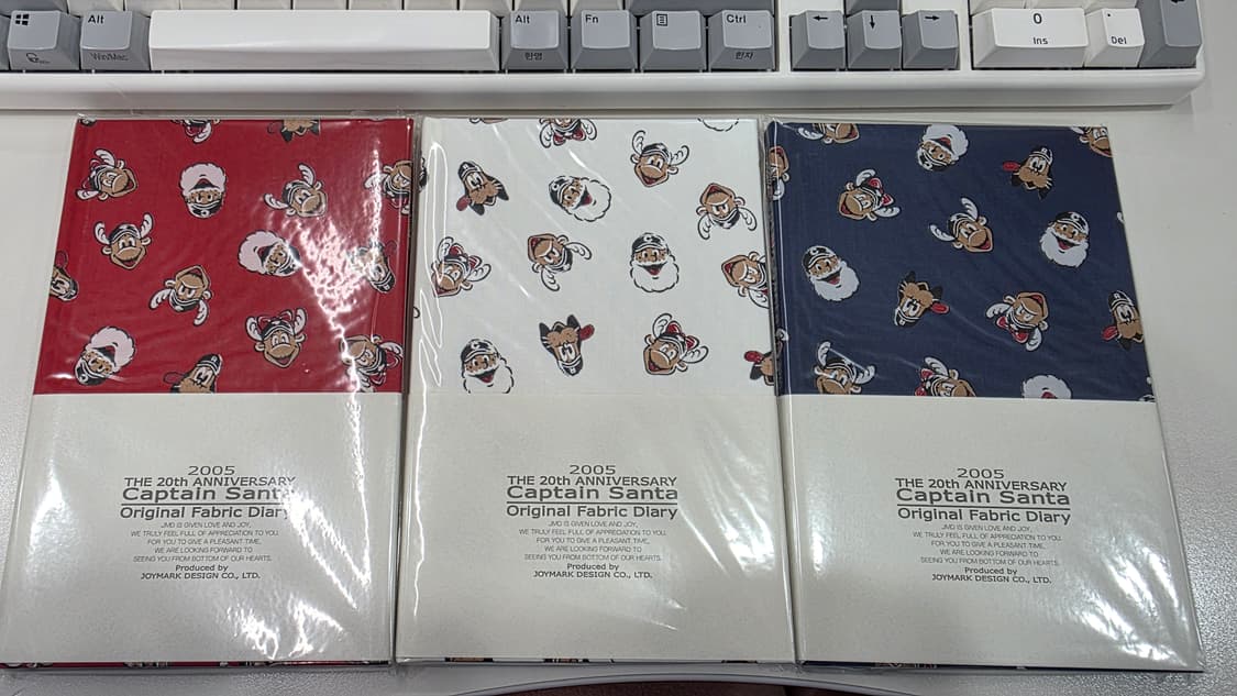 (미사용) 캡틴산타 20주년 패브릭 다이어리 상품이미지1