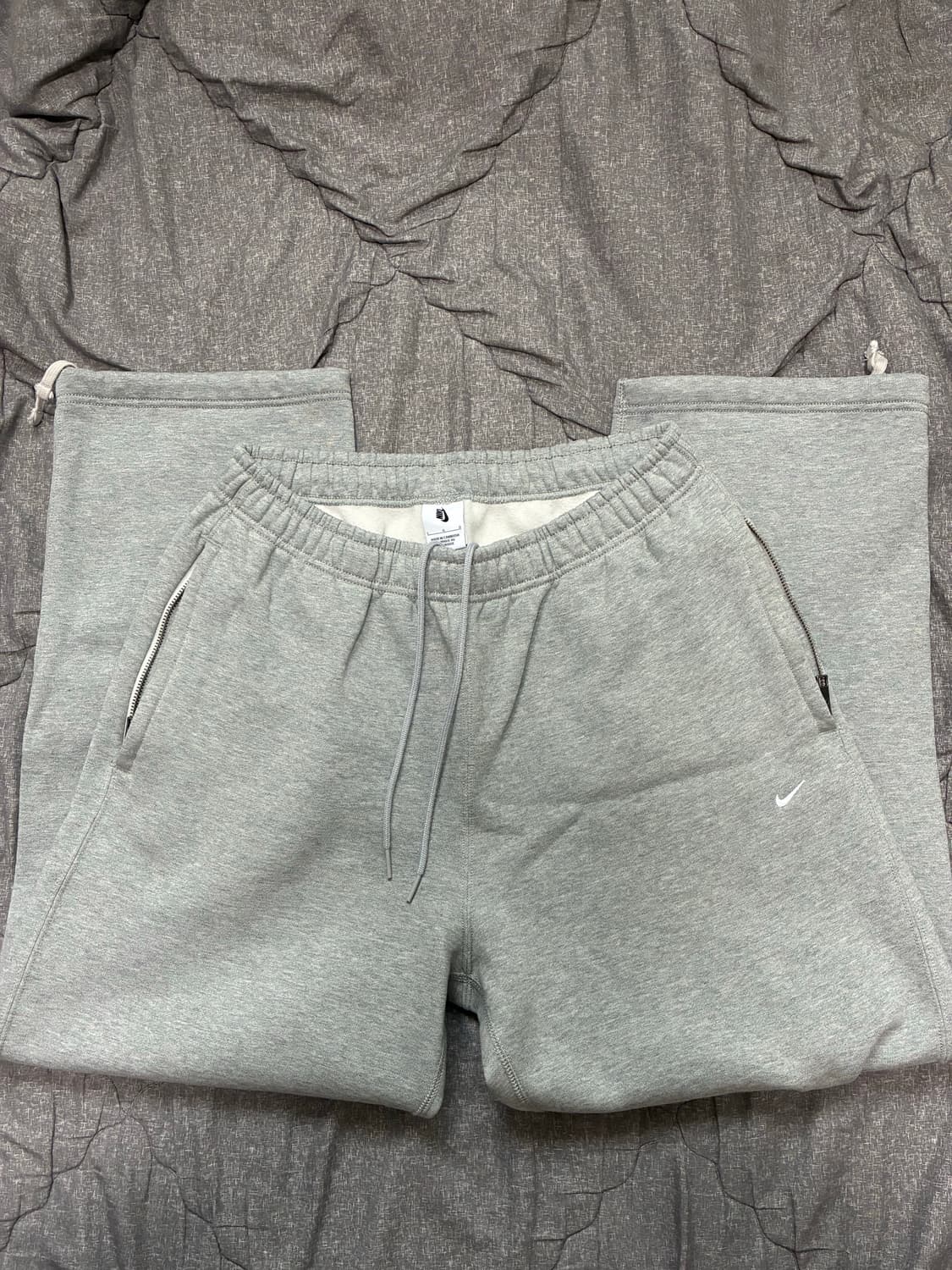 나이키 솔로 스우시 오픈 헴 팬츠  상품이미지1