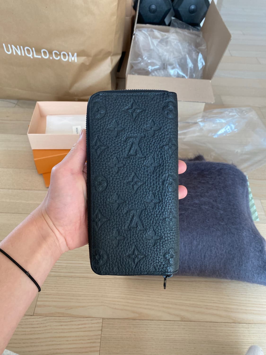 루이비통 토뤼옹 모노그램 지퍼 장지갑 상품이미지2