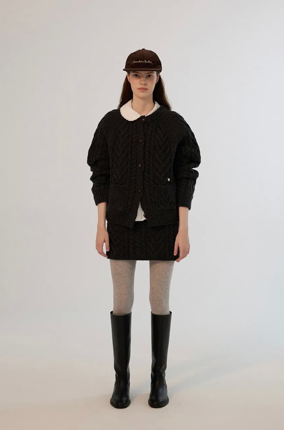 썸웨어버터 콜린 케이블 니트 스커트 상품이미지1