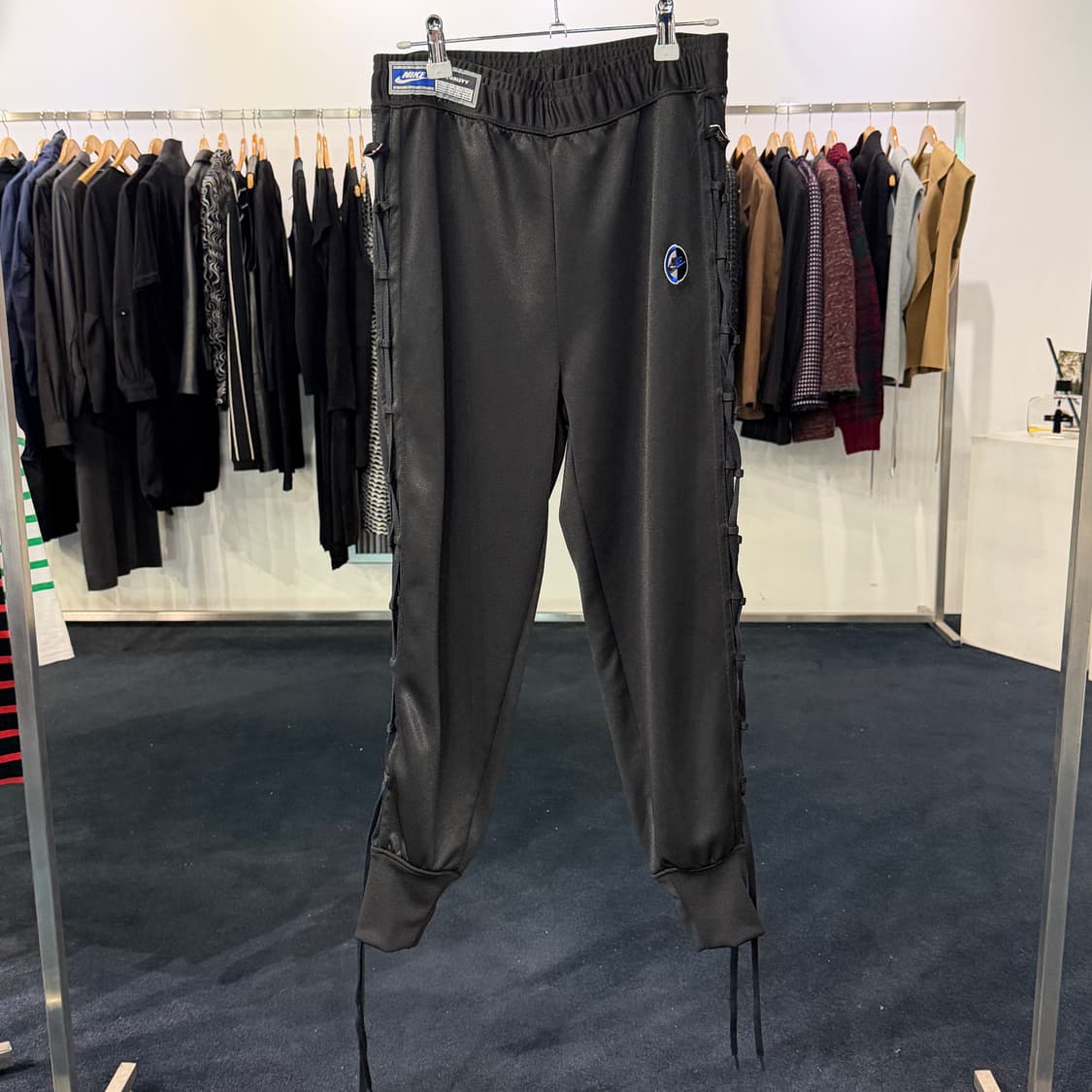 [S] 나이키 시스터후드 트랙팬츠 상품이미지1