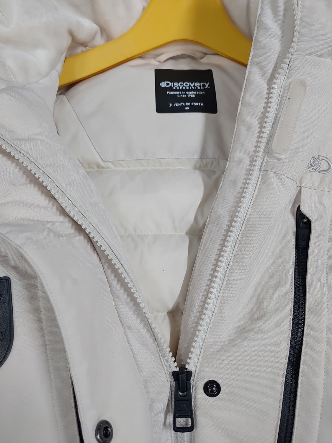 디스커버리 여성 숏 패딩 아이보리 여성90 상품이미지3