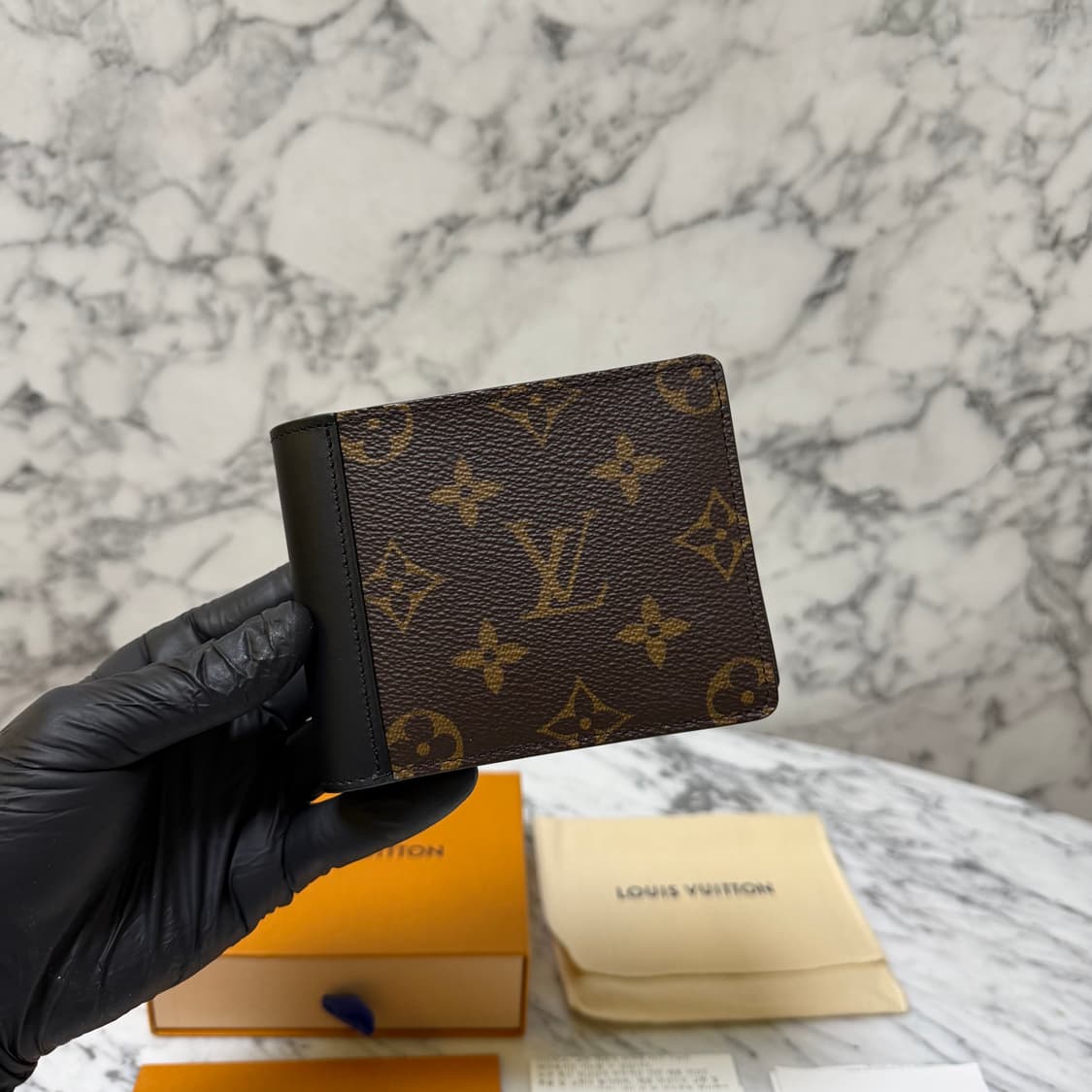 루이비통 모노그램 마카사르 멀티플 월릿 반지갑 상품이미지1