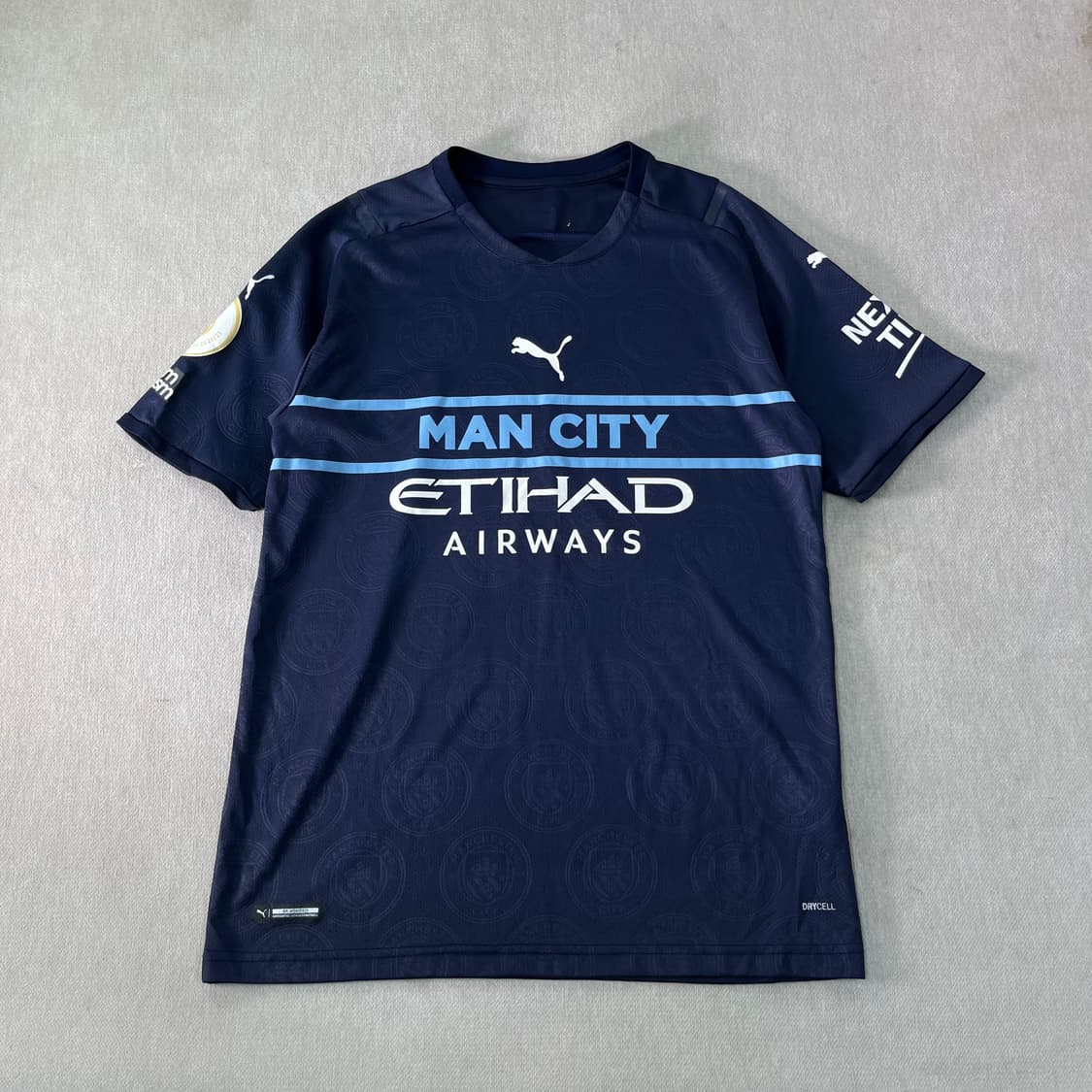 100 퓨마 맨시티 21-22써드 귄도안 유니폼 상품이미지1