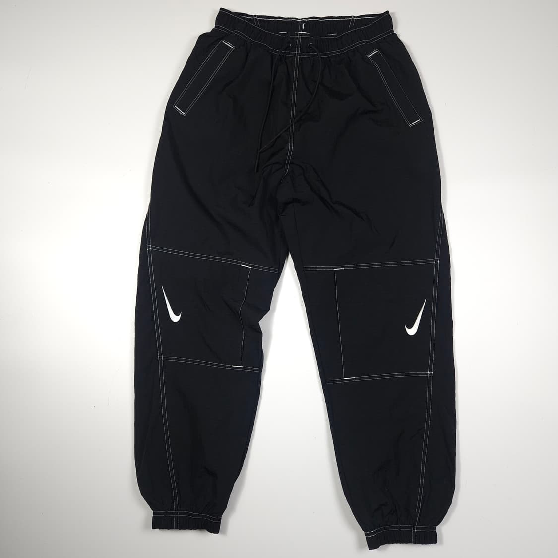 나이키 스우시 리펠 우븐팬츠  상품이미지1