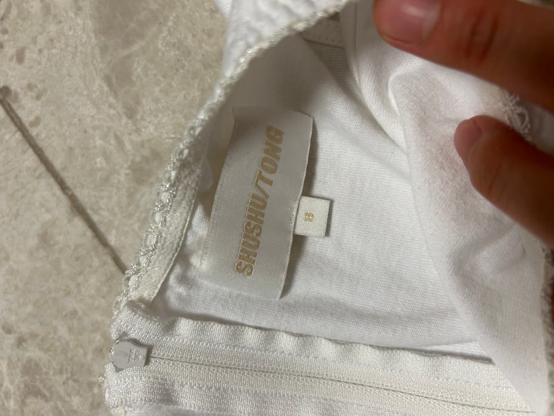 슈슈통 화이트 슬리브리스 탑 상품이미지8