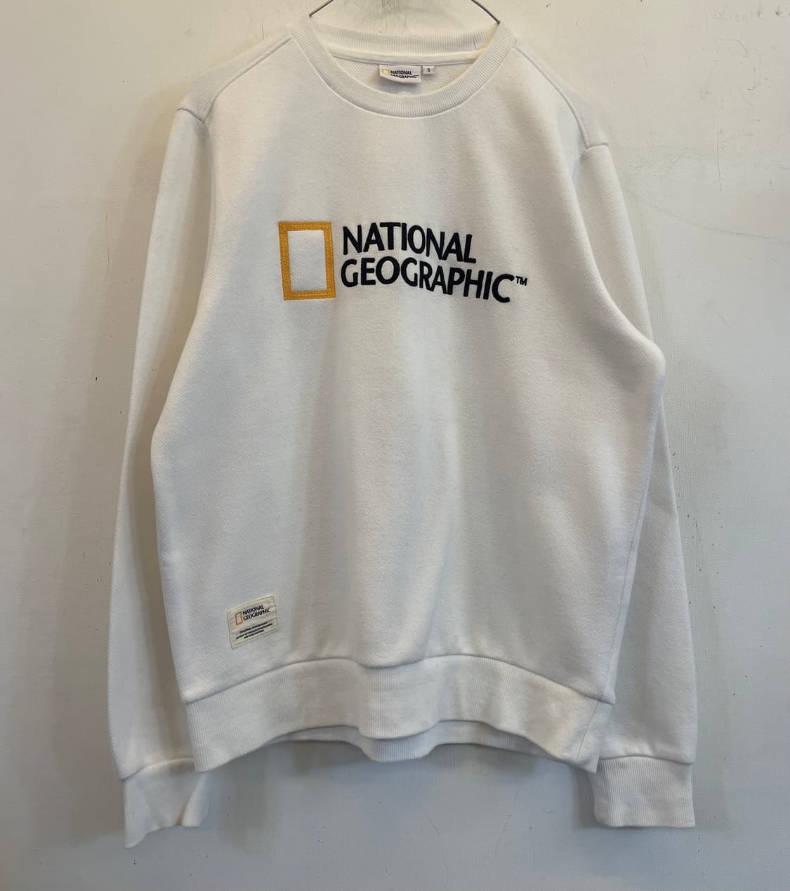 내셔널지오그래픽 화이트 맨투맨 상품이미지1