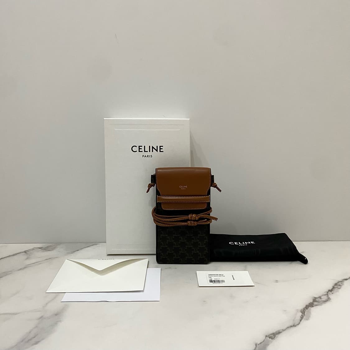 셀린느 트리옹프 캔버스 폰 파우치 휴대폰 미니백 10G332CQD04LU 상품이미지1