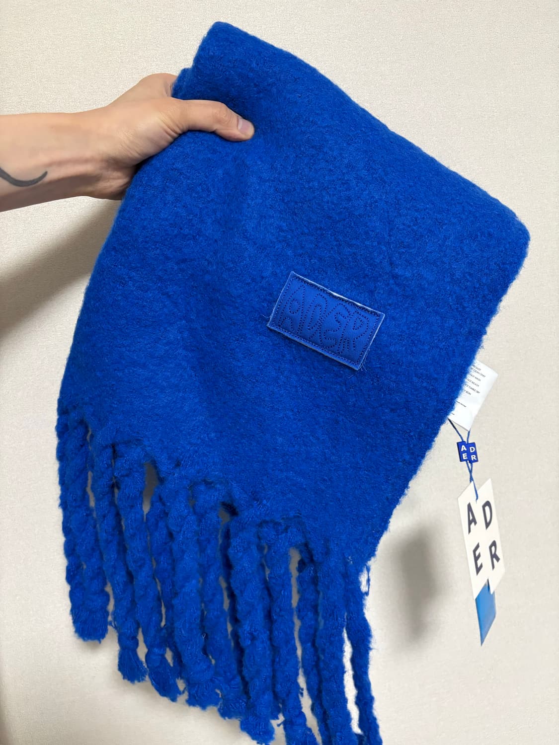 아더에러 머플러 상품이미지1