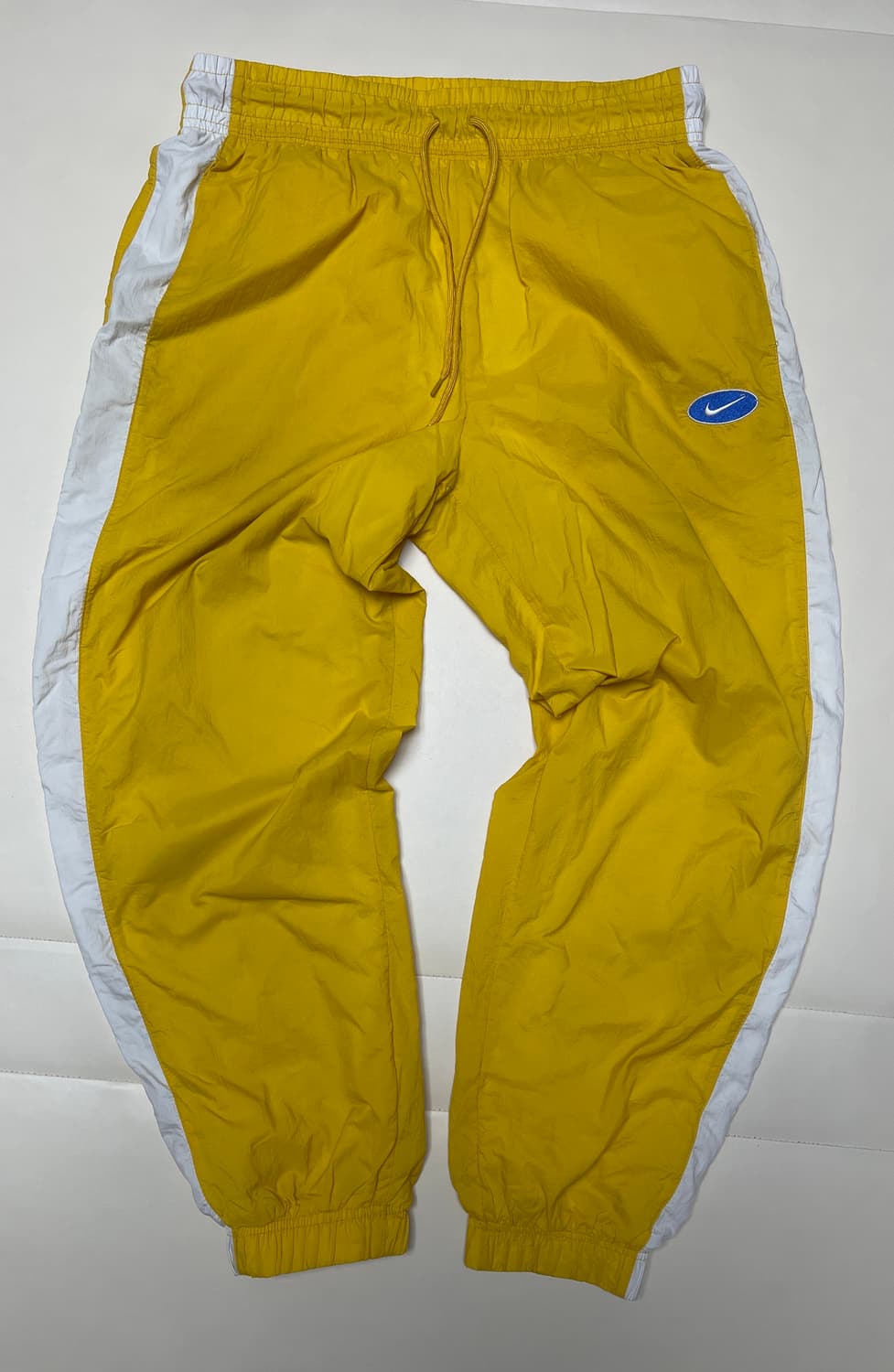 나이키 우븐 트랙 팬츠 옐로우  상품이미지1
