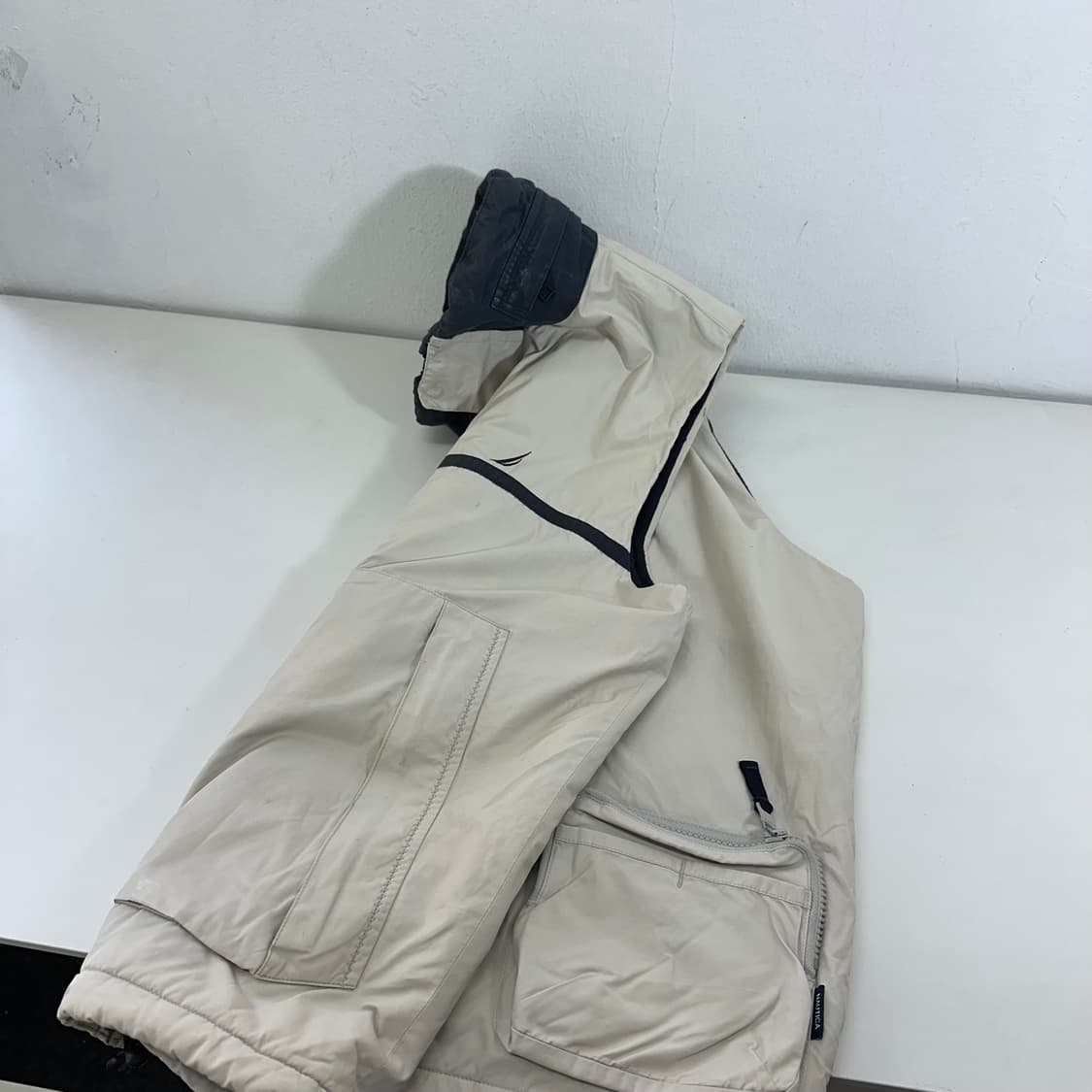 XL 노티카 딥아이보리 뒷면포켓포인트 베스트점퍼 상품이미지1