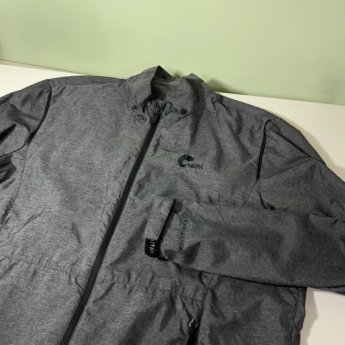 L 네파 진그레이 밑단스트링 등산 경량 바람막이 상품이미지1