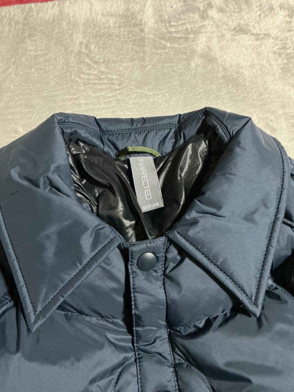 [판매] UNAFFECTED - VARSITY DOWN JUMPER 상품이미지4