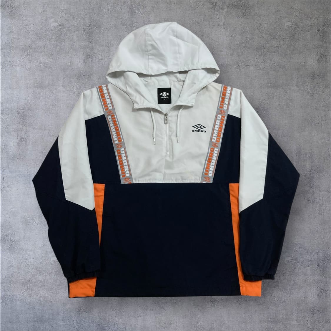 엄브로 스몰 로고 믹스 컬러 바람막이 아노락 상품이미지1