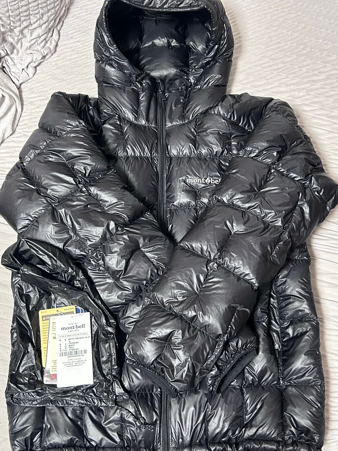 [L] 몽벨 플라즈마 1000 알파인 다운 파카 블랙 상품이미지1