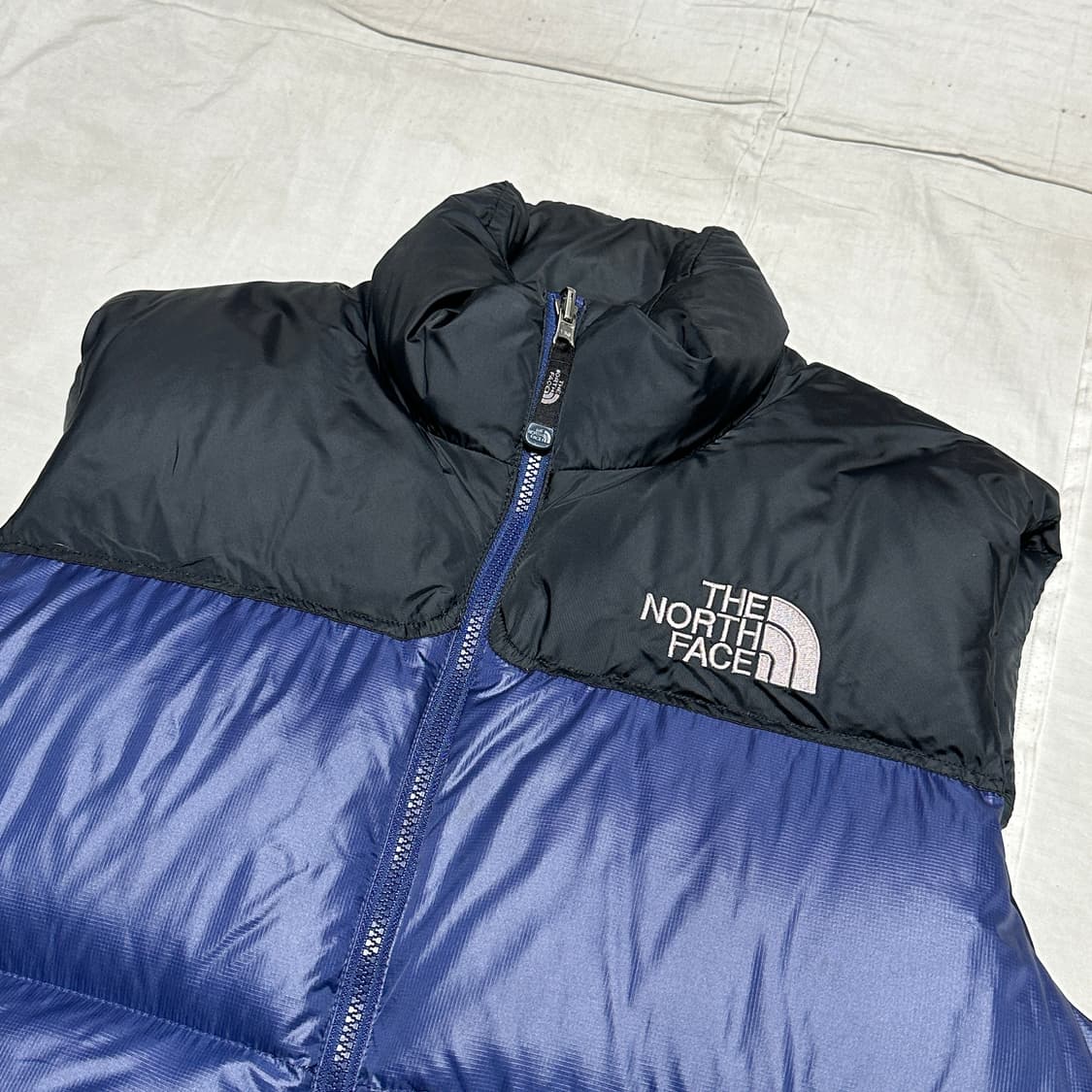 100 노스페이스 눕시 700 네이비 조끼패딩 상품이미지1