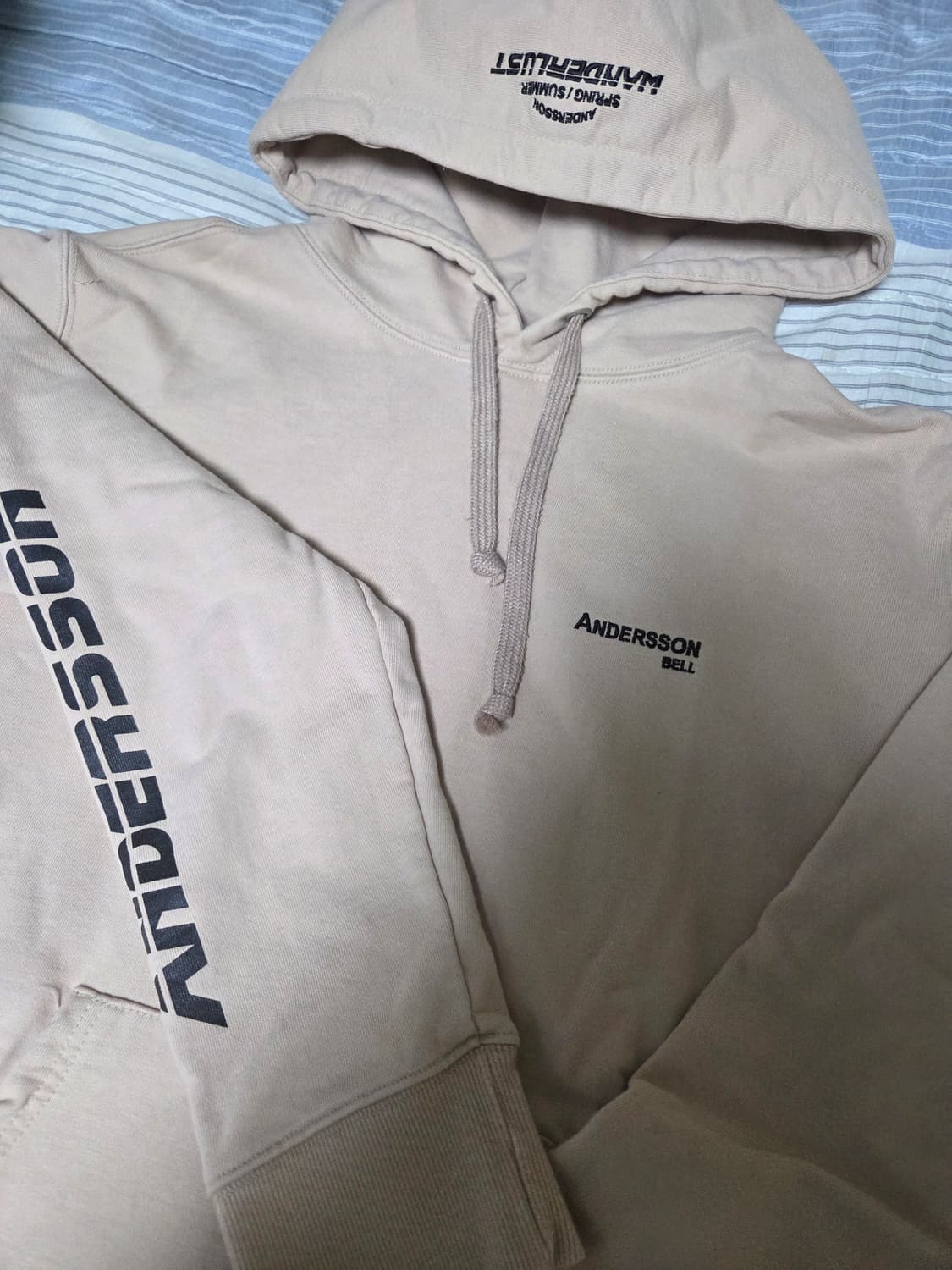 앤더슨벨 후드티 상품이미지1